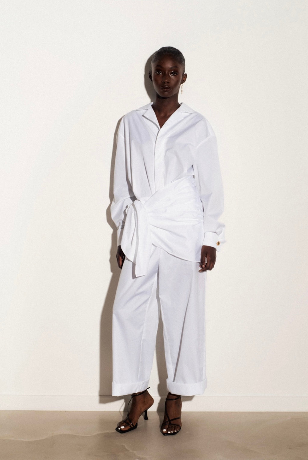 Combinaison avec drapé